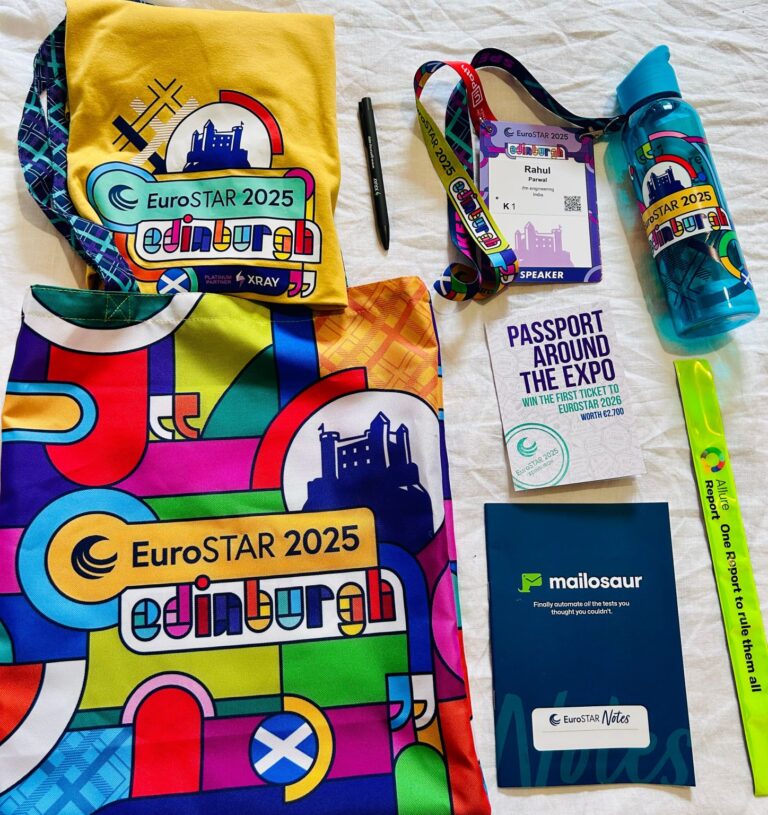 A colorful collection of EuroSTAR 2025 conference merchandise is displayed, including a badge for a speaker named Rahul, branded bags, a water bottle, a pen, brochures, and promotional materials from event sponsors, reflecting the vibrant theme and energy of the event held in Edinburgh.