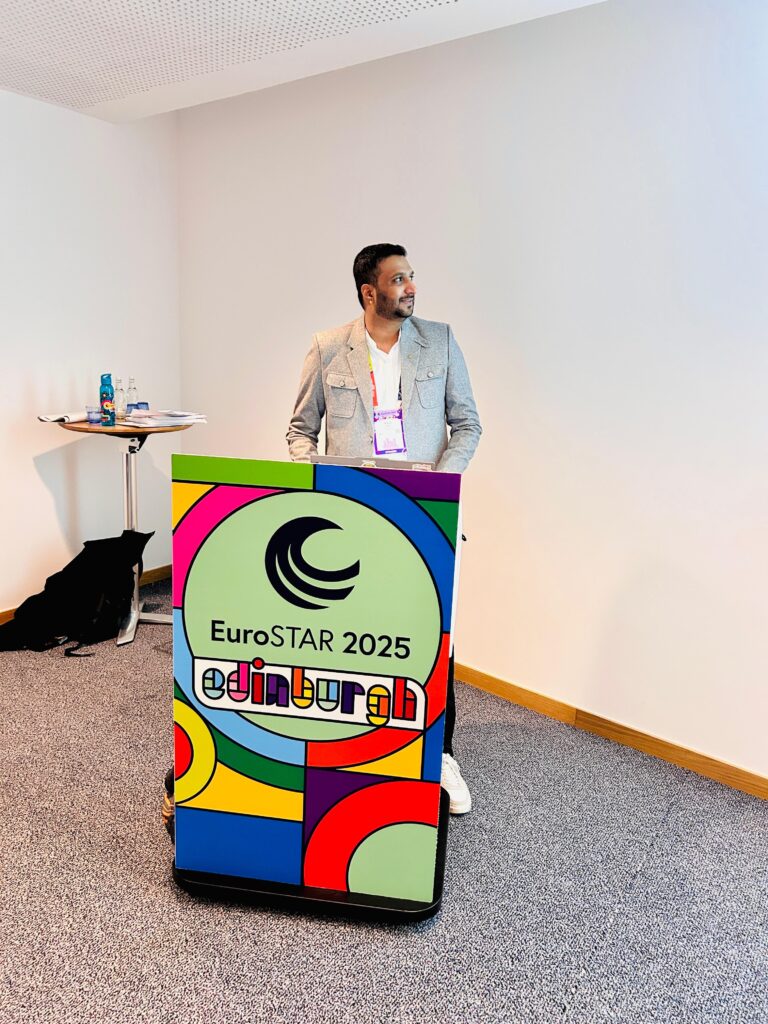 rahul parwal on the stage giving his talk in eurostar 2025