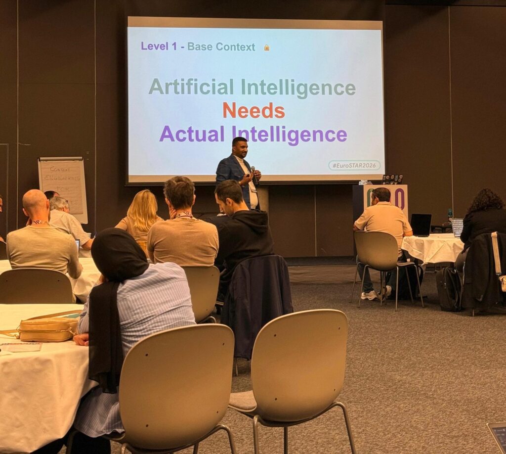 Rahul Parwal presenting the Artificial Intelligence Needs Actual Intelligence slide at EuroSTAR 2026