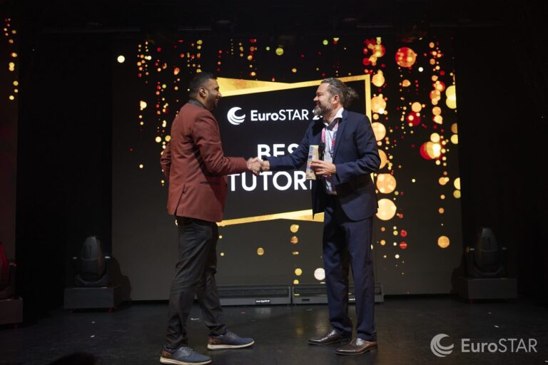 Rahul Parwal walking on stage to receive the EuroSTAR 2026 Best Tutorial Award
