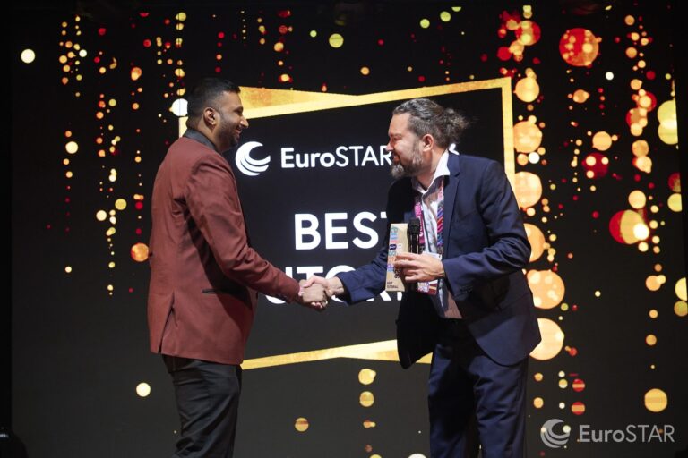 Rahul Parwal shaking hands on stage at the EuroSTAR 2026 Software Testing Awards
