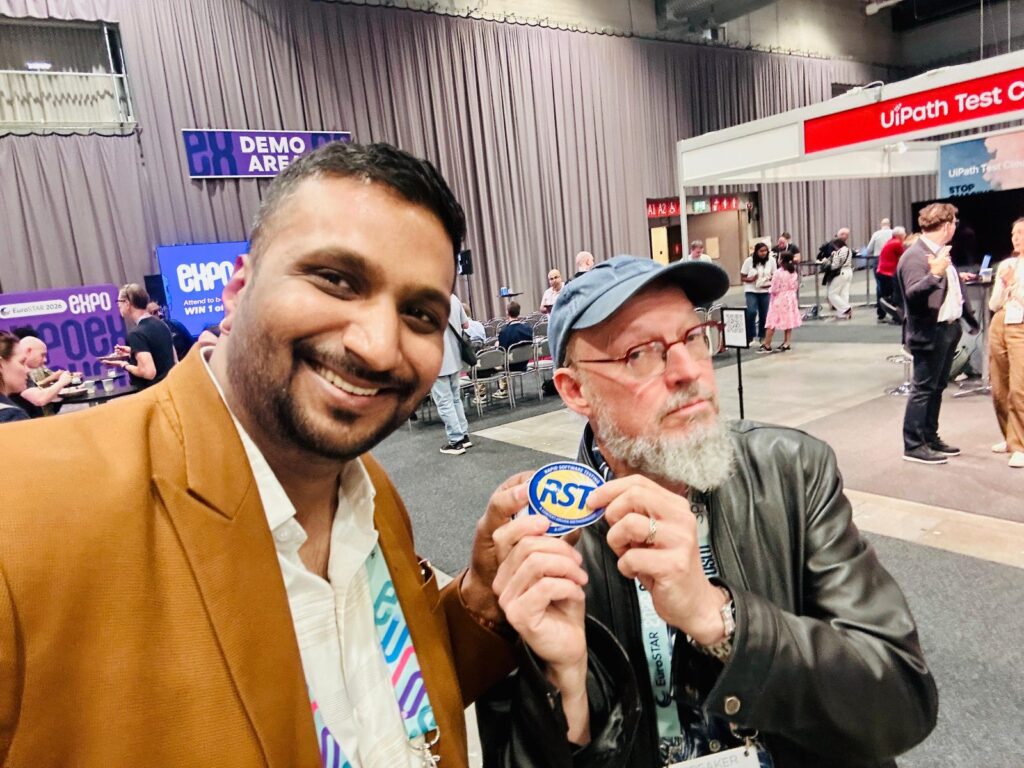 Rahul Parwal with a Rapid Software Testing sticker at EuroSTAR 2026